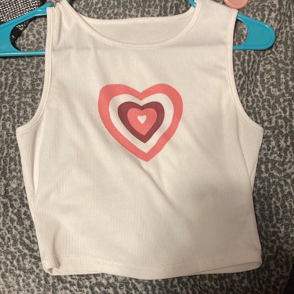 white tank top with pink heart on the front